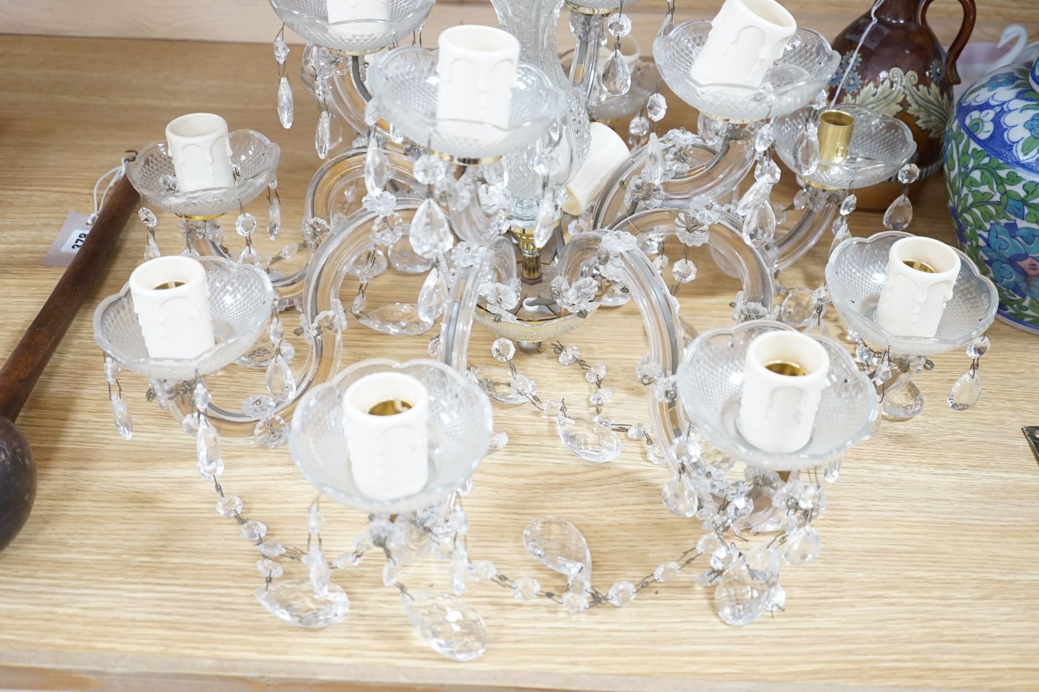 An eight branch glass electrolier, 53 cm across